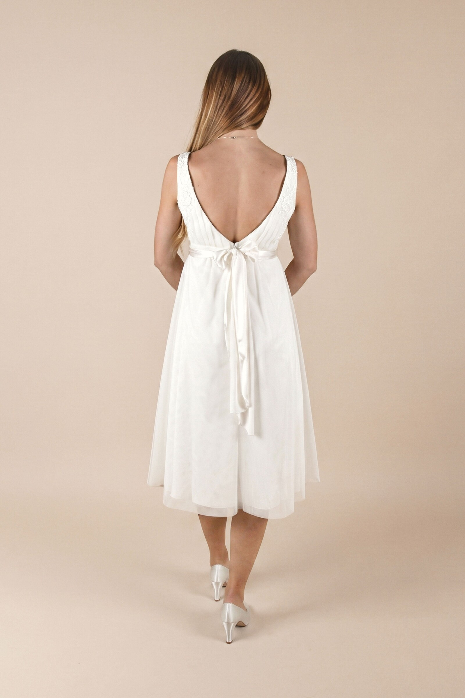 umstands-hochzeitskleid-marina-kurz-elfenbein-zuerich-03-1.jpg Umstandshochzeitskleid Marina kurz – Ivory